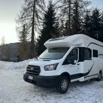 camper with the snow